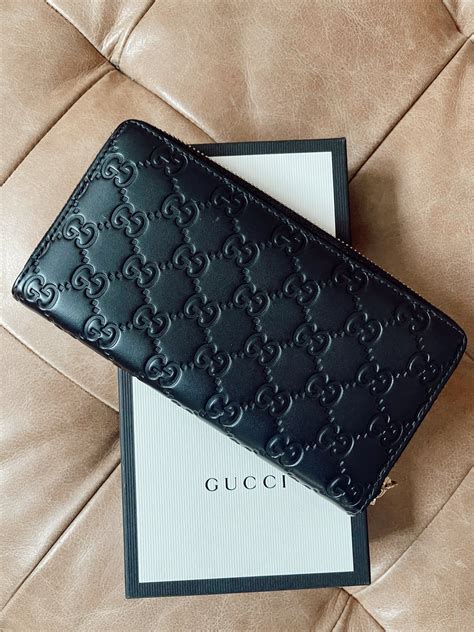 gucci zip up wallet|Gucci guccissima wallet.